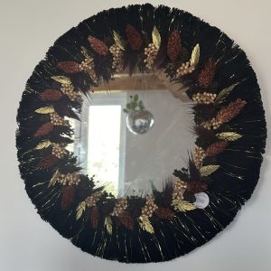 Miroir en macramé et fleurs séchées