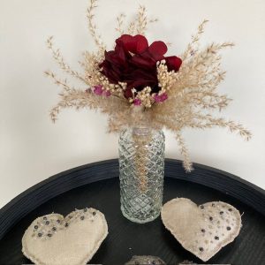 Bouquet de fleurs séchées et son vase
