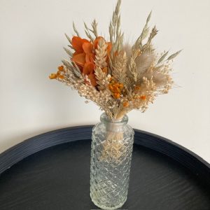 Bouquet de fleurs séchées avec son vase