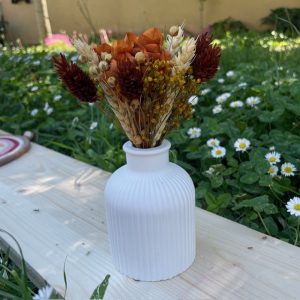 Bouquet de fleurs séchées et son vase