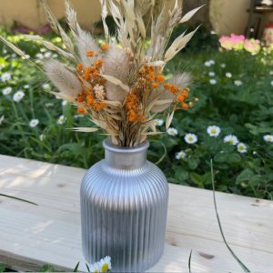 Bouquet de fleurs séchées et son vase